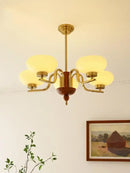 Brass and cream glass pendant chandelier for dining room