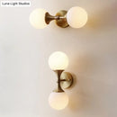 Brass and ivory glass ball wall lamp for bedroom 2 head sconce