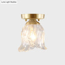 Brass semi flush mount with clear fluted glass for living room