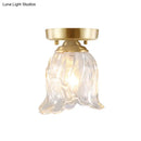 Brass semi flush mount with clear fluted glass for living room