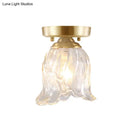 Brass semi flush mount with clear fluted glass for living room