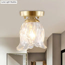 Brass semi flush mount with clear fluted glass for living room
