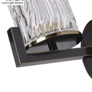 Brass wall light with cylinder rippled glass – bedroom sconce