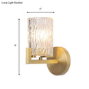 Brass wall light with cylinder rippled glass – bedroom sconce