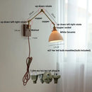 Brass walnut wall light with ribbed glass shade for bedroom