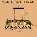 Bronze birdcage pendant lights with garland for dining room