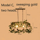 Bronze birdcage pendant lights with garland for dining room