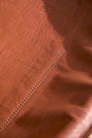 brown genuine leather hanging round chair teak frame product shot-closeup