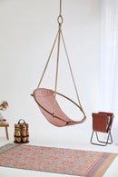 brown genuine leather hanging round chair teak frame product shot angle view