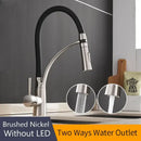 Brushed nickel and black kitchen sink faucet with pull down spray
