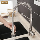 Brushed nickel kitchen faucet with pull down coiled gooseneck spout