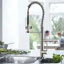 Brushed nickel spring kitchen faucet with pull down spray head