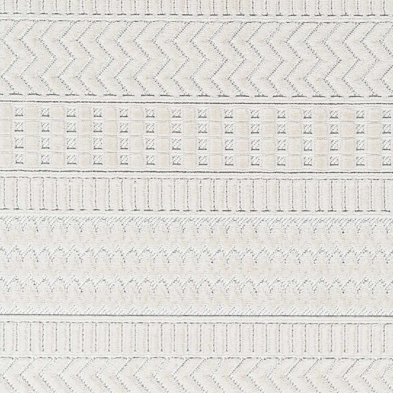 Cira Ivory Textured Area Rug with Fringes