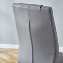 Table and chair set.71 * 35.4 inch rectangular dining table.Tempered Glass Tabletop,Silver 7-shaped Metal Table Legs.Paried With 6 Dark Gray High-quality PU Chairs With Arched Metal Legs.