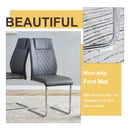 Table and chair set.63'x31.5x30' Luxurious Pandora patterned Sintered Stone Tabletop with Silver Stainless Steel Butterfly Legs.Paried With 6 Dark Gray High-quality PU Chairs With Arched Metal Legs.