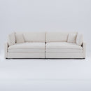 The 112-inch beige corduroy sofa, with two throw pillows and four backrests, has opened up a new style for the living room's leisure area