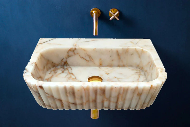 Calacatta Gold Marble Wall-mount Bathroom Vanity Sink Fluted (W)16" (L)20" (H)6" bathroom view blue background brass faucet and drain