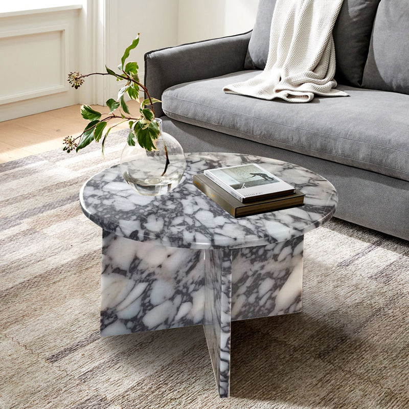 calacatta viola marble coffee table marble legs round top D24 H16 angle view living room magazines on the table and gray couch