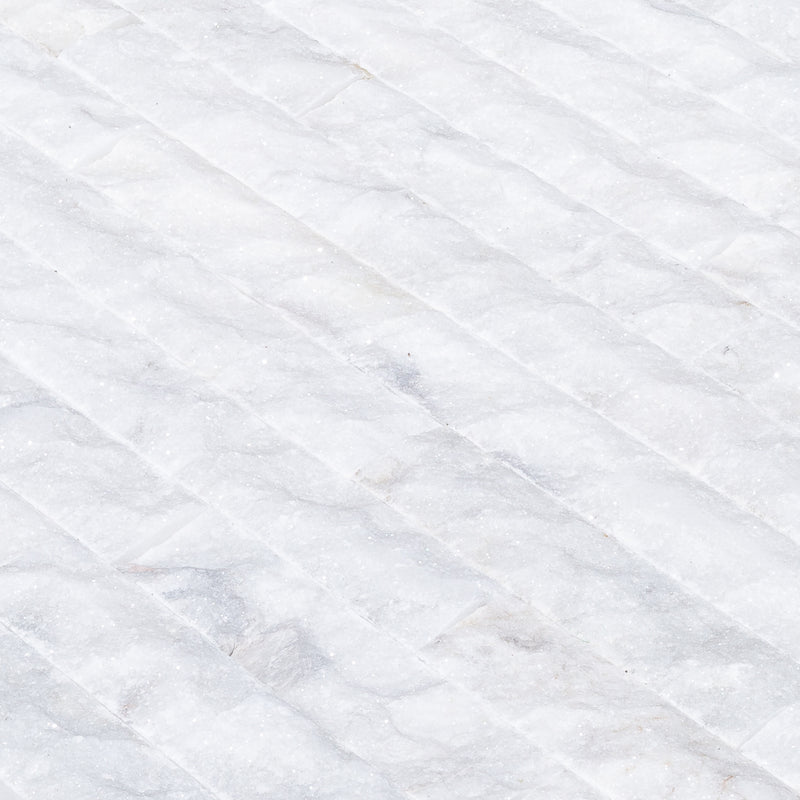 Carrara White 4"xFree Length Split-face Natural Marble Wall Tile - Belair Collection angle closeup view