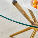 Round clear glass dining table with a unique shape for 4-6 people, with ring-shaped gathered gold metal legs, suitable for desks, kitchens, terraces, dining rooms.