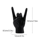 Chic black glossy rock hand gesture sculpture living room decor