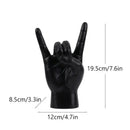 Chic black glossy rock hand gesture sculpture living room decor