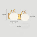 Classic brass glass wall sconce with frosted shade for bedroom