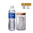 Clear glass storage jars with bamboo lids for kitchen organization