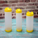 Clear red white & yellow tomato squeeze bottle kitchen set