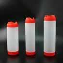 Clear red white & yellow tomato squeeze bottle kitchen set