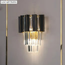 Contemporary black & gold wall lamp with clear crystal prisms bedroom