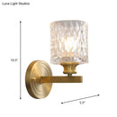 Contemporary brass cylindrical wall light bedroom faceted glass sconce