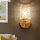 Contemporary brass cylindrical wall light bedroom faceted glass sconce
