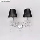 Contemporary chrome and crystal wall light fixture living room black