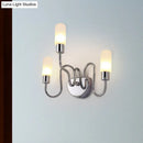 Contemporary chrome milk glass pill sconce bedroom wall light