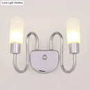 Contemporary chrome milk glass pill sconce bedroom wall light