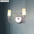 Contemporary chrome milk glass pill sconce bedroom wall light
