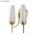 Contemporary gold and opal conical wall sconce bedroom light