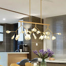 Contemporary gold & black branching island chandelier dining room