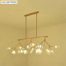 Contemporary gold & black branching island chandelier dining room
