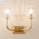 Contemporary gold dome foyer wall light with clear lattice glass