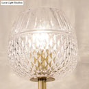 Contemporary gold dome foyer wall light with clear lattice glass