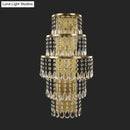 Contemporary gold layered bedside wall lamp with teardrop crystals