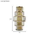 Contemporary gold layered bedside wall lamp with teardrop crystals