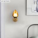Contemporary gold teardrop sconce light for bedroom with frosted glass