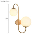 Contemporary gold wall sconce bedroom light with opal glass shade