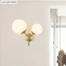 Contemporary gold & white spherical glass light fixture bedroom sconce