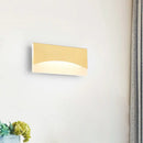 Contemporary white & gold bedroom sconce with warm color temperature