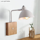 Contemporary white metal wall mounted lamp with wood base bedroom light