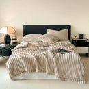 Cozy coral fleece wavy ribbed cream throw blanket for living room